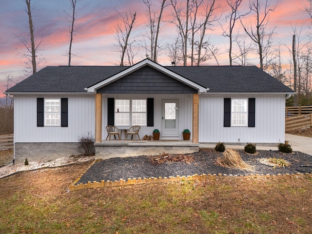 ranch-style house featuring a porch