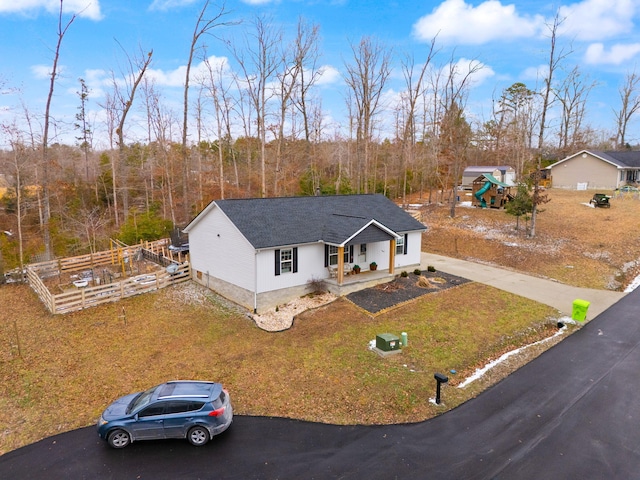 view of front of home featuring a porch and a front yard