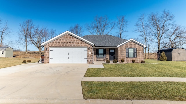 view of front facade featuring a garage, a front yard, and a shed