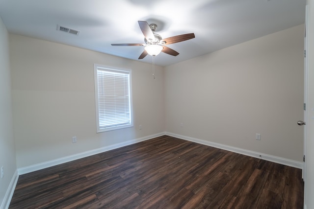 unfurnished room featuring dark hardwood / wood-style flooring and ceiling fan