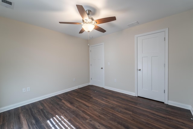 2053 Partridge Way, Richmond, KY 40475 - unfurnished bedroom with baseboards, dark wood-type flooring, and a ceiling fan