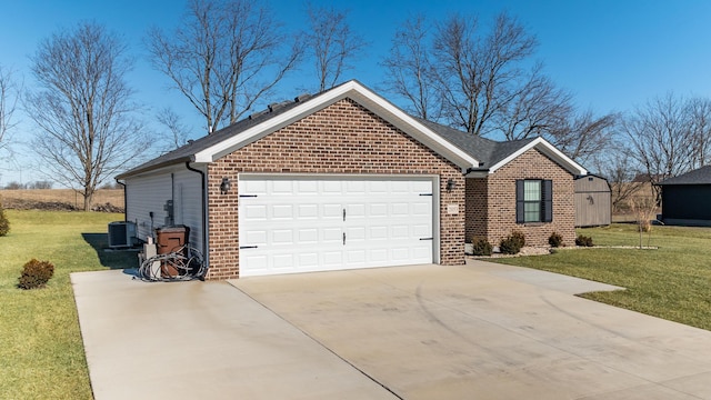 ranch-style house with a garage, a front yard, and central air condition unit