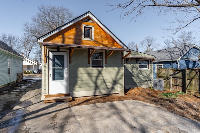 back of property with a patio