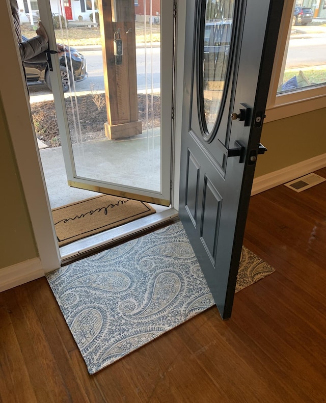 entryway featuring dark hardwood / wood-style floors