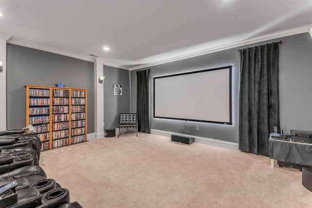 cinema room featuring light carpet and crown molding