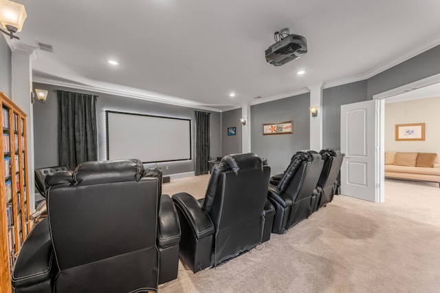 carpeted cinema room featuring crown molding