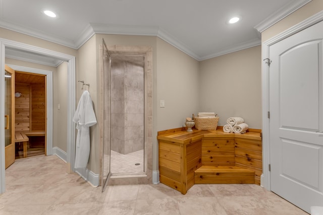 bathroom with crown molding and walk in shower