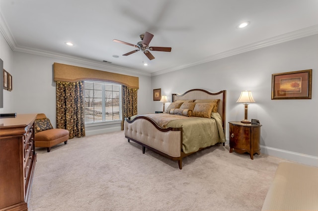 carpeted bedroom featuring ceiling fan and ornamental molding