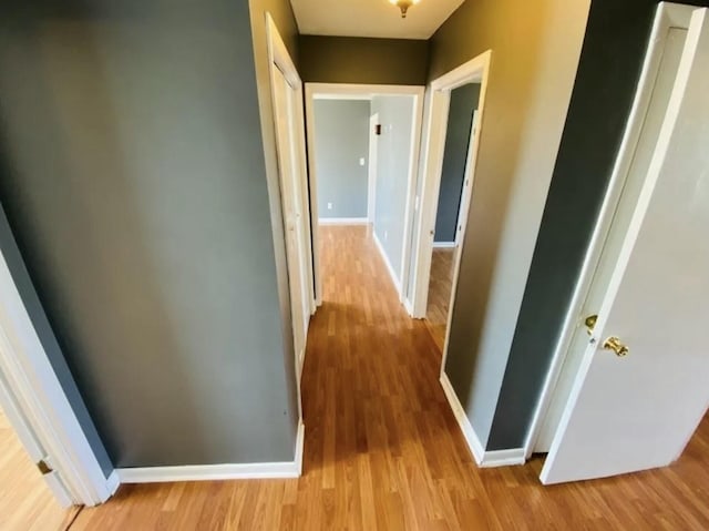 hallway featuring light hardwood / wood-style floors