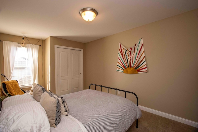 carpeted bedroom featuring a closet