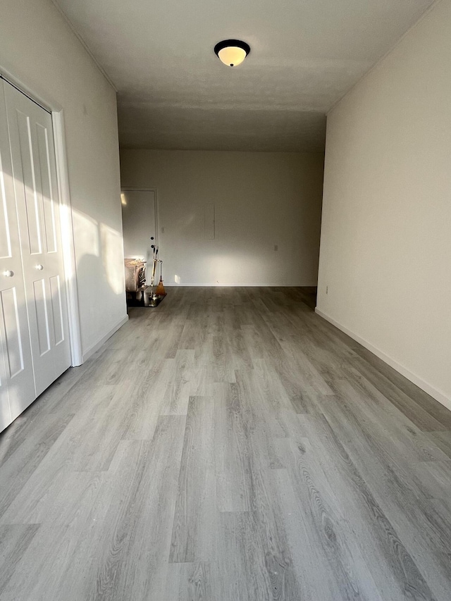 unfurnished room featuring light hardwood / wood-style floors