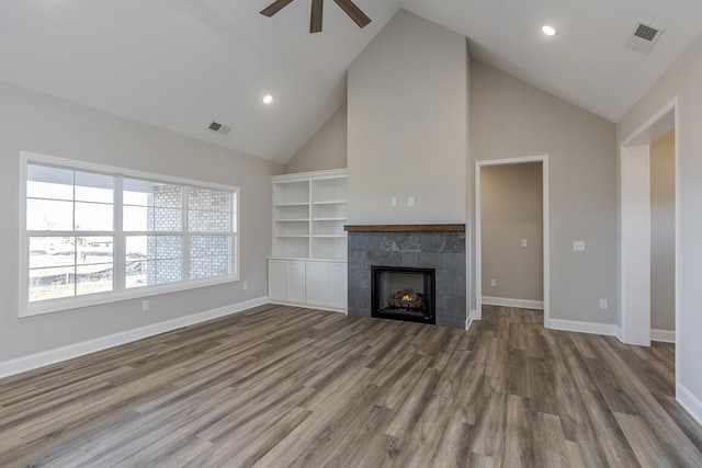100 Zane Ln, Nicholasville, KY 40356 - unfurnished living room with visible vents, wood finished floors, baseboards, ceiling fan, and high vaulted ceiling