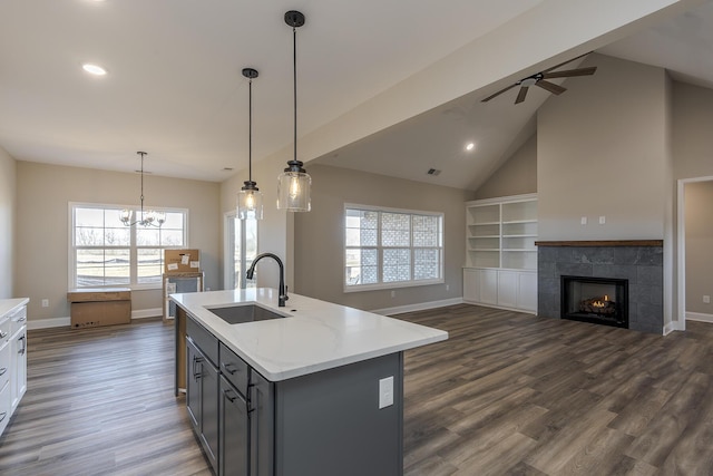 100 Zane Ln, Nicholasville, KY 40356 - kitchen featuring a sink, baseboards, ceiling fan with notable chandelier, and dark wood-style floors