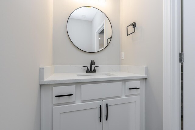 mudroom featuring dark wood-style floors, visible vents, and baseboards