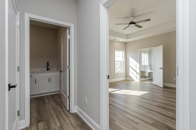100 Zane Ln, Nicholasville, KY 40356 - hallway with baseboards, a sink, and dark wood-style flooring