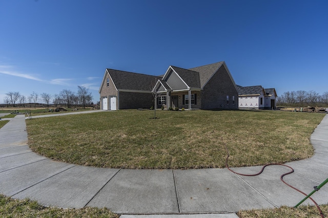 100 Zane Ln, Nicholasville, KY 40356 - view of property exterior with brick siding, a yard, and driveway