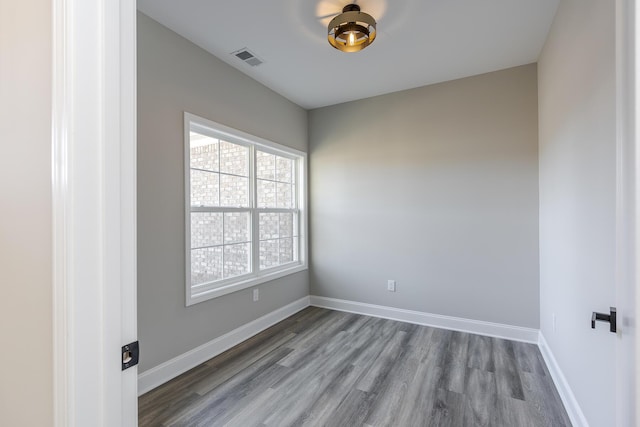 100 Zane Ln, Nicholasville, KY 40356 - empty room with baseboards, visible vents, and wood finished floors