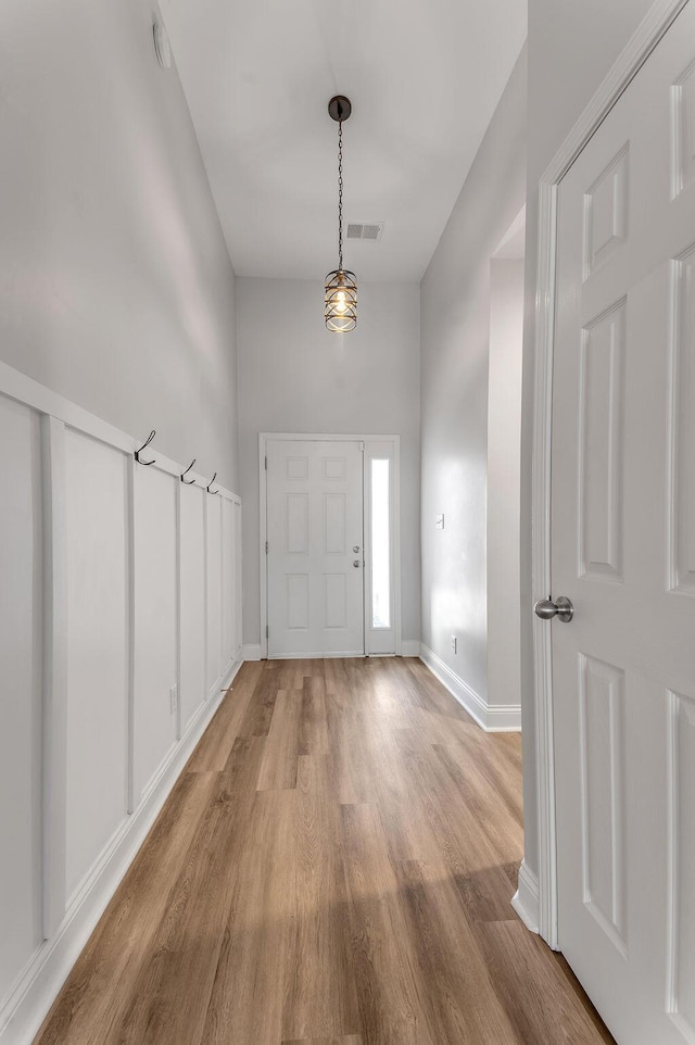 entrance foyer featuring hardwood / wood-style flooring