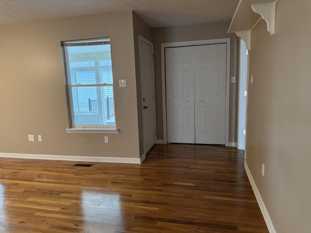 interior space featuring dark hardwood / wood-style flooring