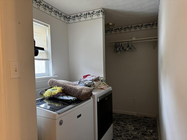 laundry area with washer and clothes dryer