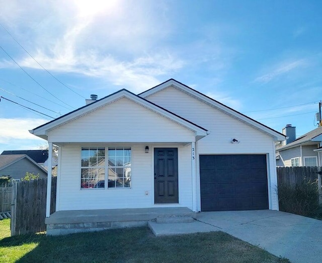 view of front facade featuring a garage and a porch