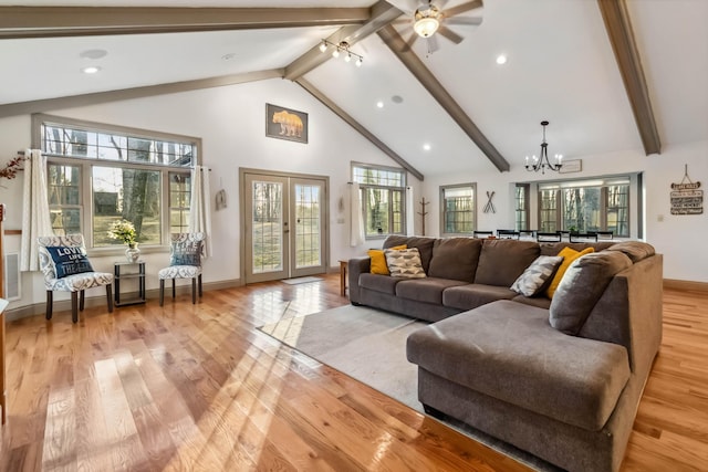 living room with french doors, a chandelier, high vaulted ceiling, beam ceiling, and light hardwood / wood-style floors