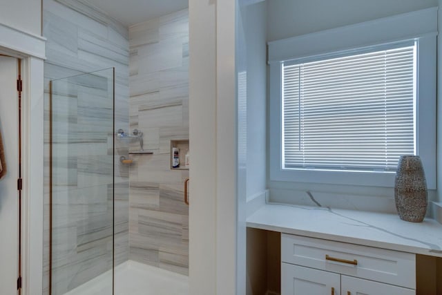 bathroom with a shower stall