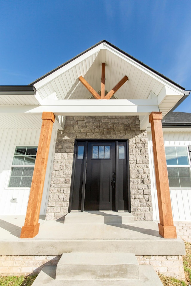 property entrance featuring covered porch