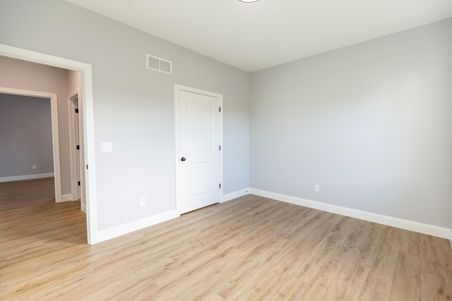 unfurnished bedroom with light hardwood / wood-style floors