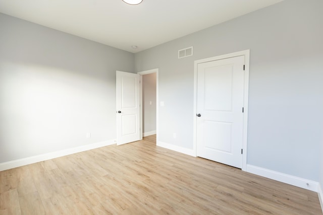 unfurnished bedroom featuring light hardwood / wood-style flooring