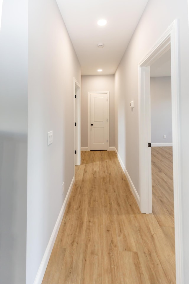 corridor featuring light wood-type flooring