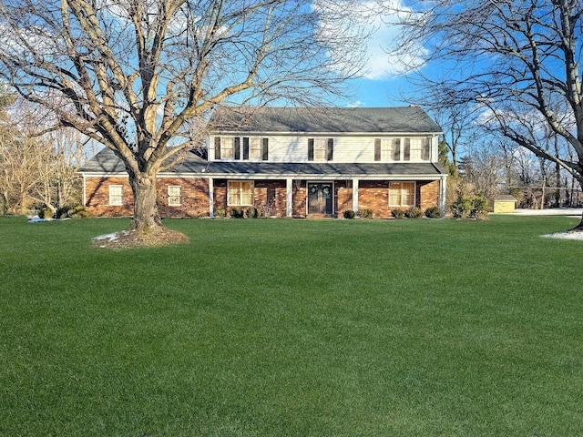 colonial home with a front lawn