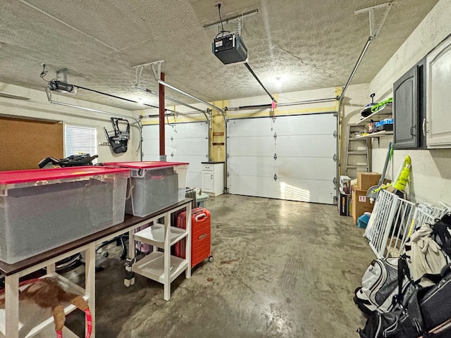 garage featuring a garage door opener