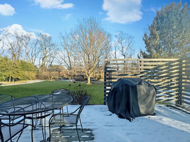 exterior space featuring a patio, a yard, and a grill