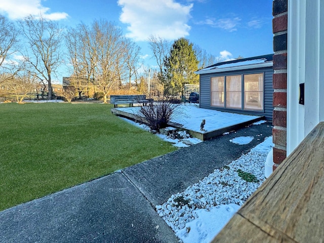 view of yard layered in snow