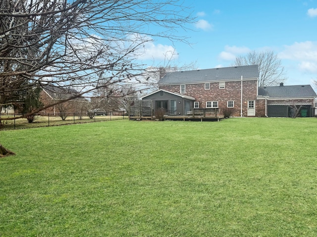 view of yard with a deck