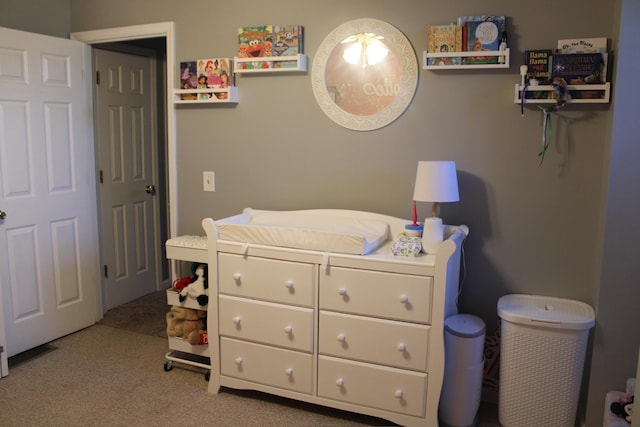 bedroom featuring light carpet