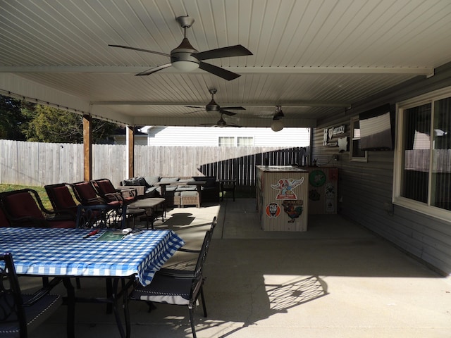 view of patio / terrace with ceiling fan and an outdoor hangout area