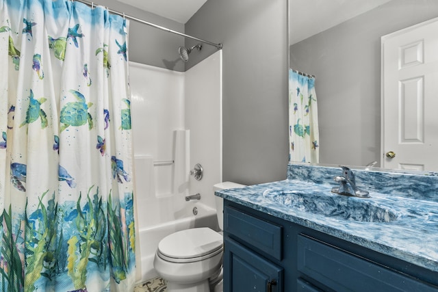 bathroom featuring vanity, toilet, and shower / tub combo