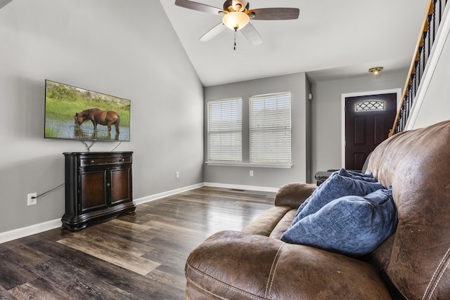 living room with ceiling fan, stairway, baseboards, high vaulted ceiling, and dark wood-style floors