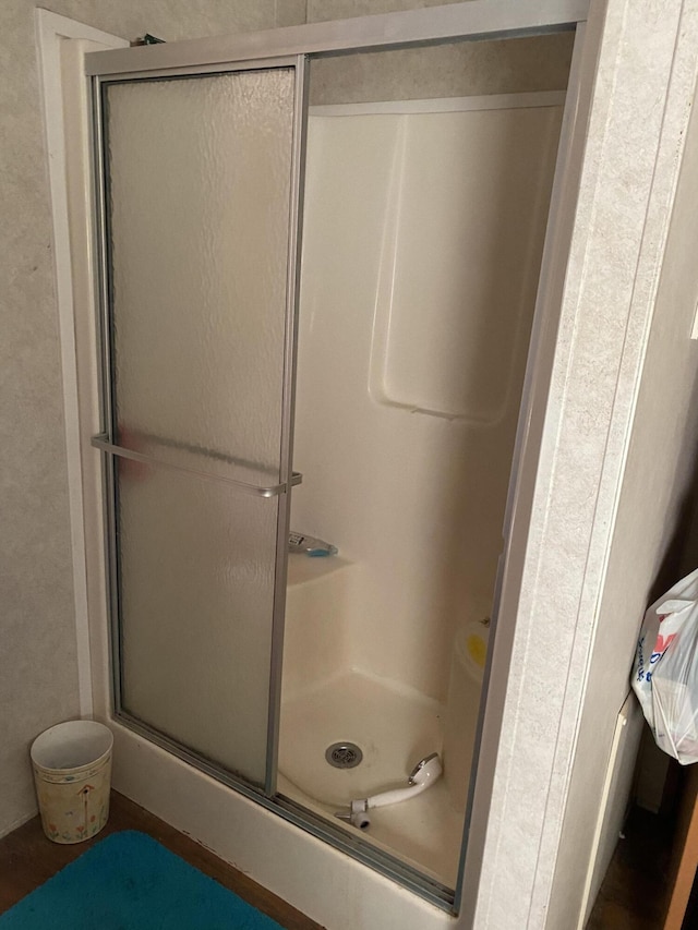 bathroom with an enclosed shower