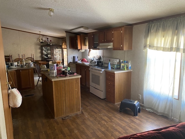 kitchen with white electric range oven, crown molding, a textured ceiling, dark hardwood / wood-style flooring, and a kitchen island