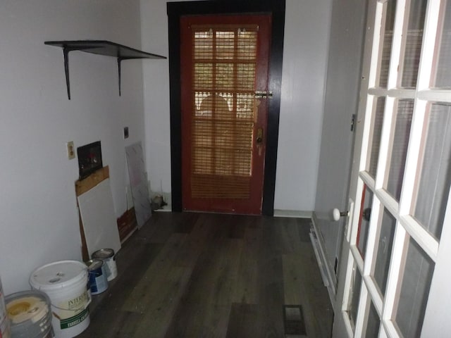 doorway to outside featuring dark hardwood / wood-style flooring