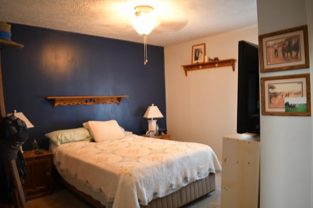 bedroom featuring a textured ceiling