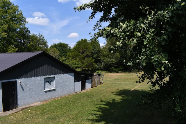 view of home's exterior with a lawn