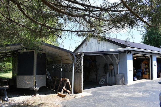 exterior space with a carport