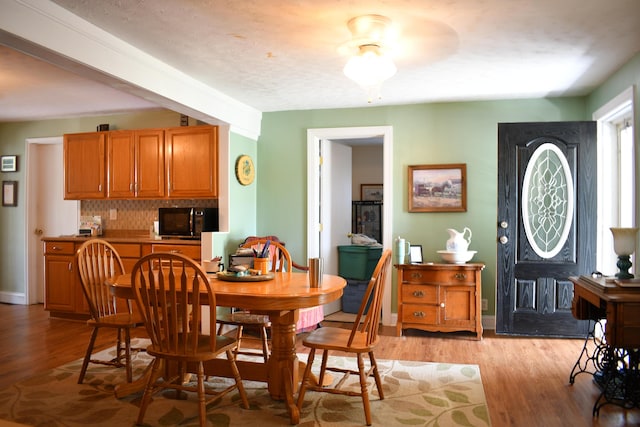 dining room featuring light hardwood / wood-style floors