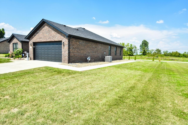 view of property exterior featuring a garage, a yard, and central AC unit