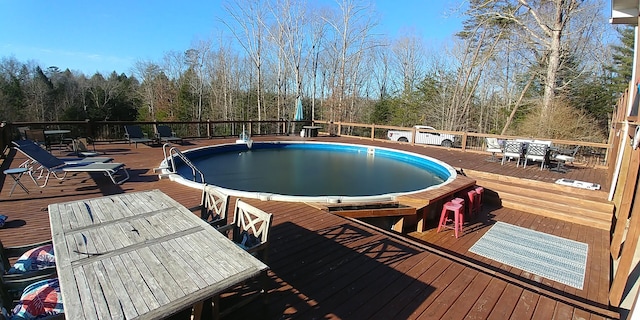 view of pool featuring a deck