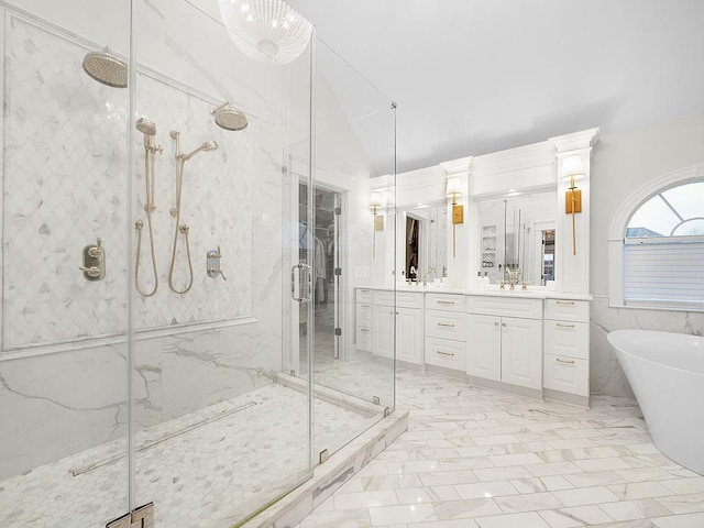 bathroom with vanity, vaulted ceiling, and plus walk in shower